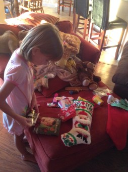 Hannah opening Christmas gifts 2015